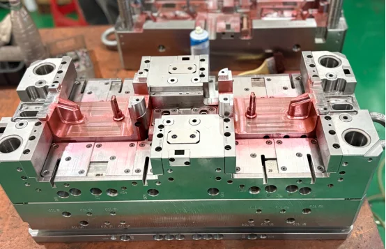 Complex steel injection mold base assembly with sliders